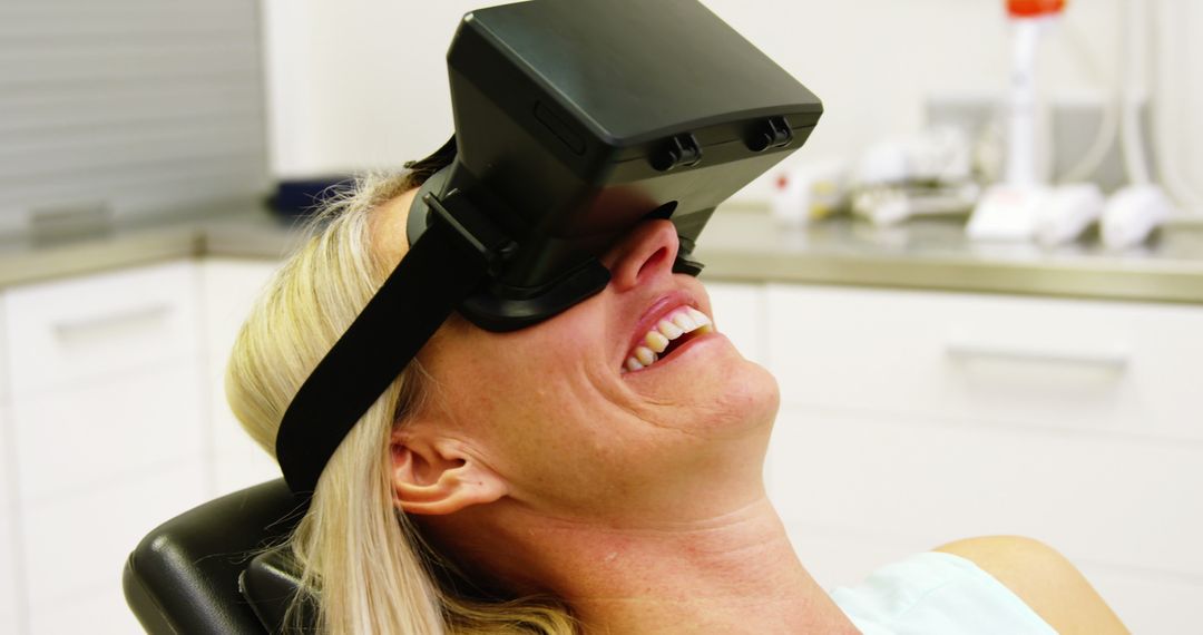 Woman Using Virtual Reality Headset for Dental Distraction - Free Images, Stock Photos and Pictures on Pikwizard.com