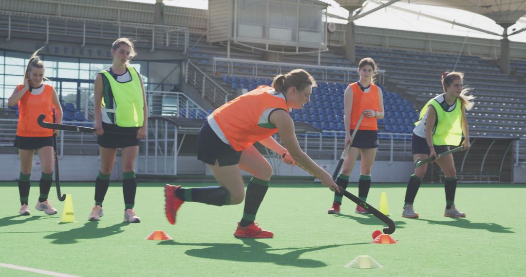 Female Field Hockey Team Training Drills on Turf Field - Free Images, Stock Photos and Pictures on Pikwizard.com