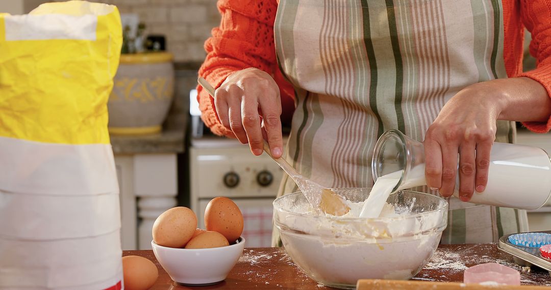 Woman Preparing Dough Ingredients in Rustic Kitchen - Free Images, Stock Photos and Pictures on Pikwizard.com