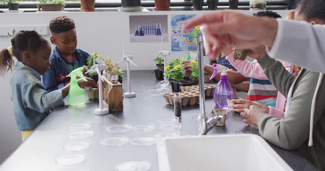 Children Engaging in Science Activity with Plants in Classroom - Free Images, Stock Photos and Pictures on Pikwizard.com