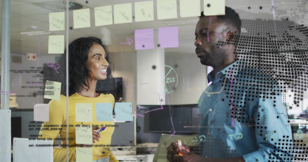 Dynamic Team Collaborating on Ideas with Glass Board