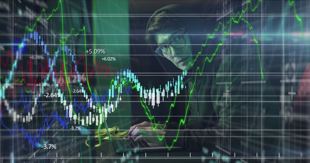 Asian Man Analyzing Financial Data Graphs in Server Room