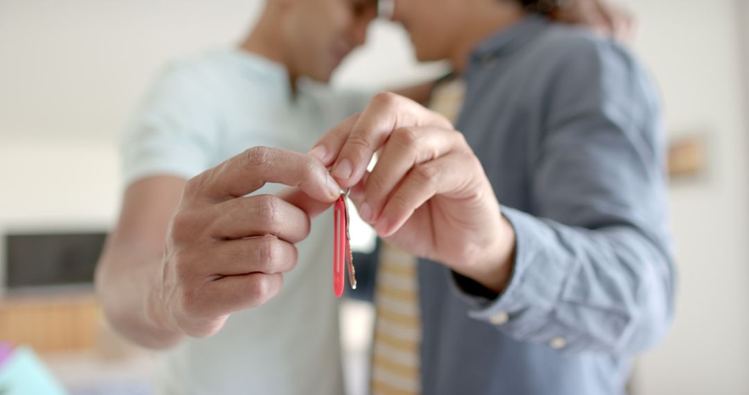 Close-Up of Gay Couple Holding House Keys, New Home and Relationship Concept - Free Images, Stock Photos and Pictures on Pikwizard.com