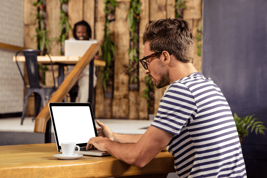 Transparent Cafe Scene with Man Using Laptop