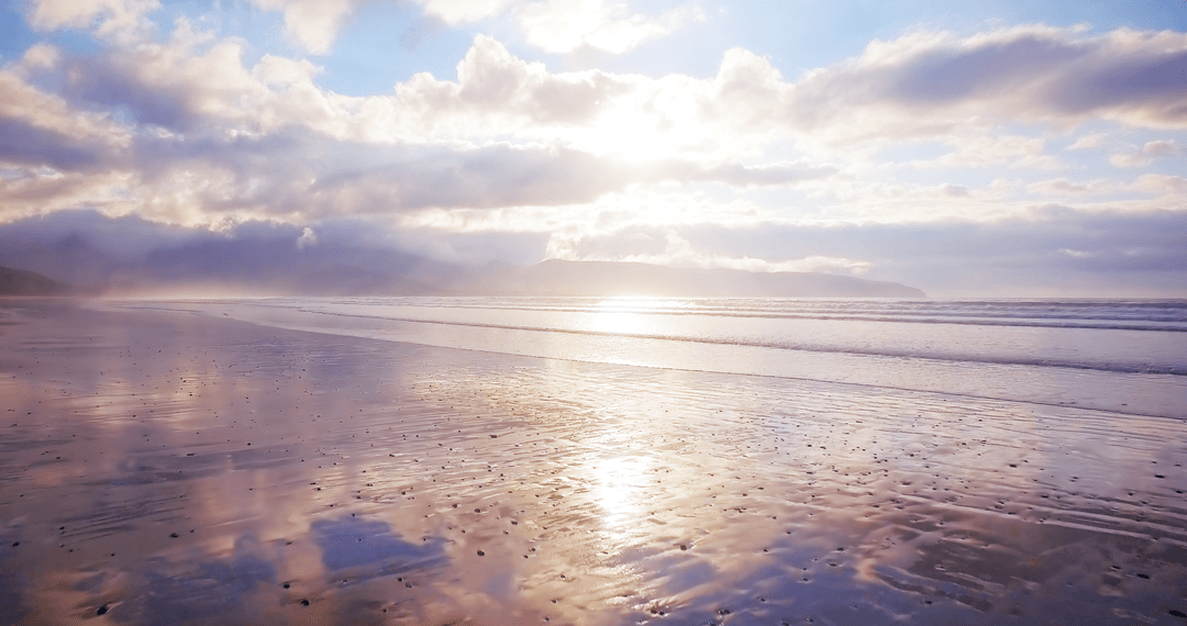 Transparent Sunlit Beach and Cloudy Sky Landscape