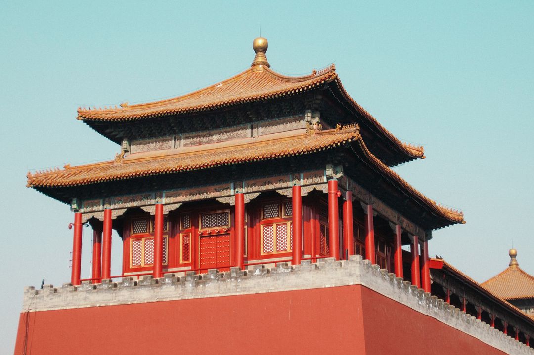 Traditional Chinese Architecture with Red Walls and Gold Roof - Free Images, Stock Photos and Pictures on Pikwizard.com