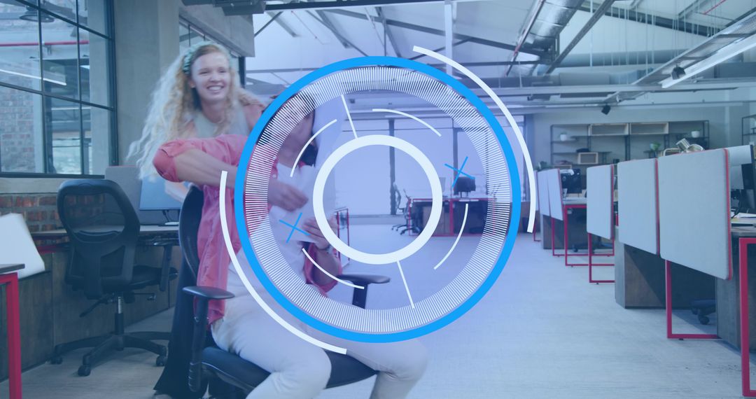 Pushing coworker on rolling chair while team collaborating in open-plan office with HUD overlay