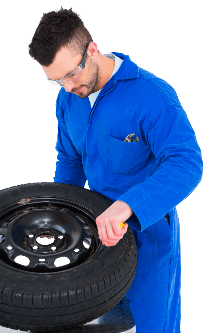 Transparent View of Mechanic in Blue Jumpsuit Inspecting Car Tire