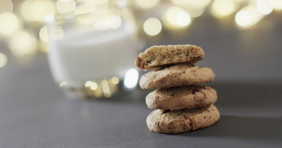 Festive Christmas Cookies with Milk and Bokeh Lights