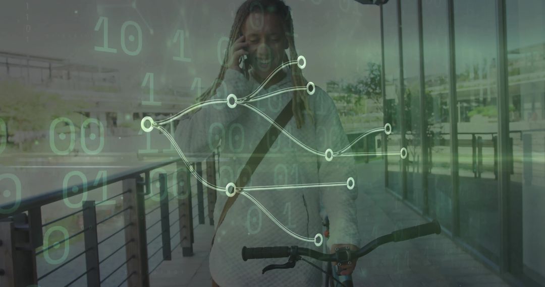 Man Pushing Bicycle While Engaging with Smartphone Technology