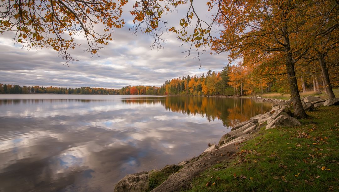 Serene Autumn Lake with Reflective Surface and Colorful Foliage