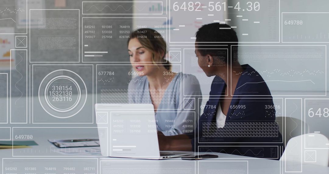 Diverse Business Team Analyzing Data in Office