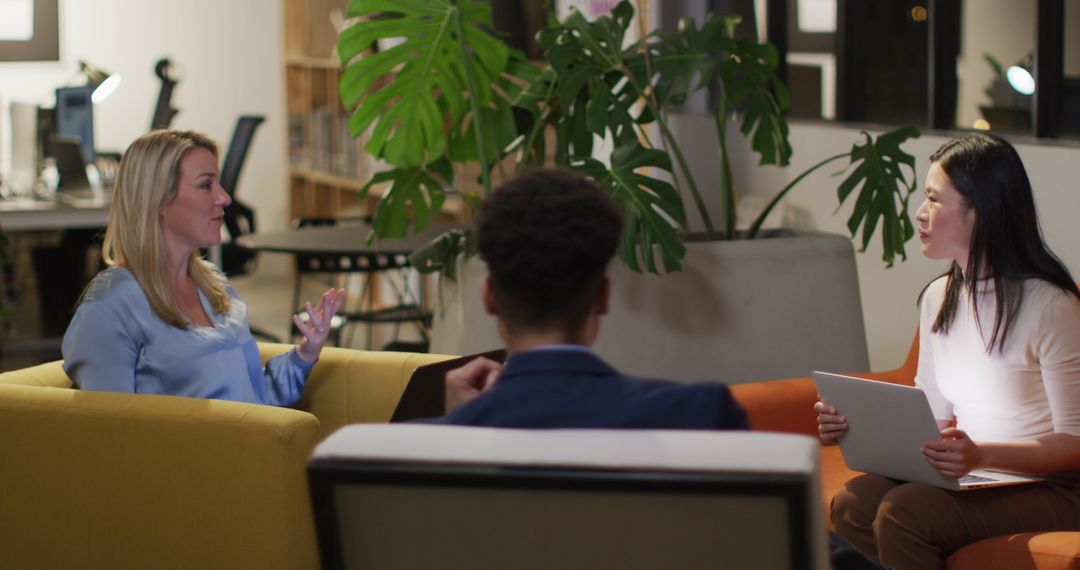 Business Meeting in Modern Office with Diverse Team Collaborating