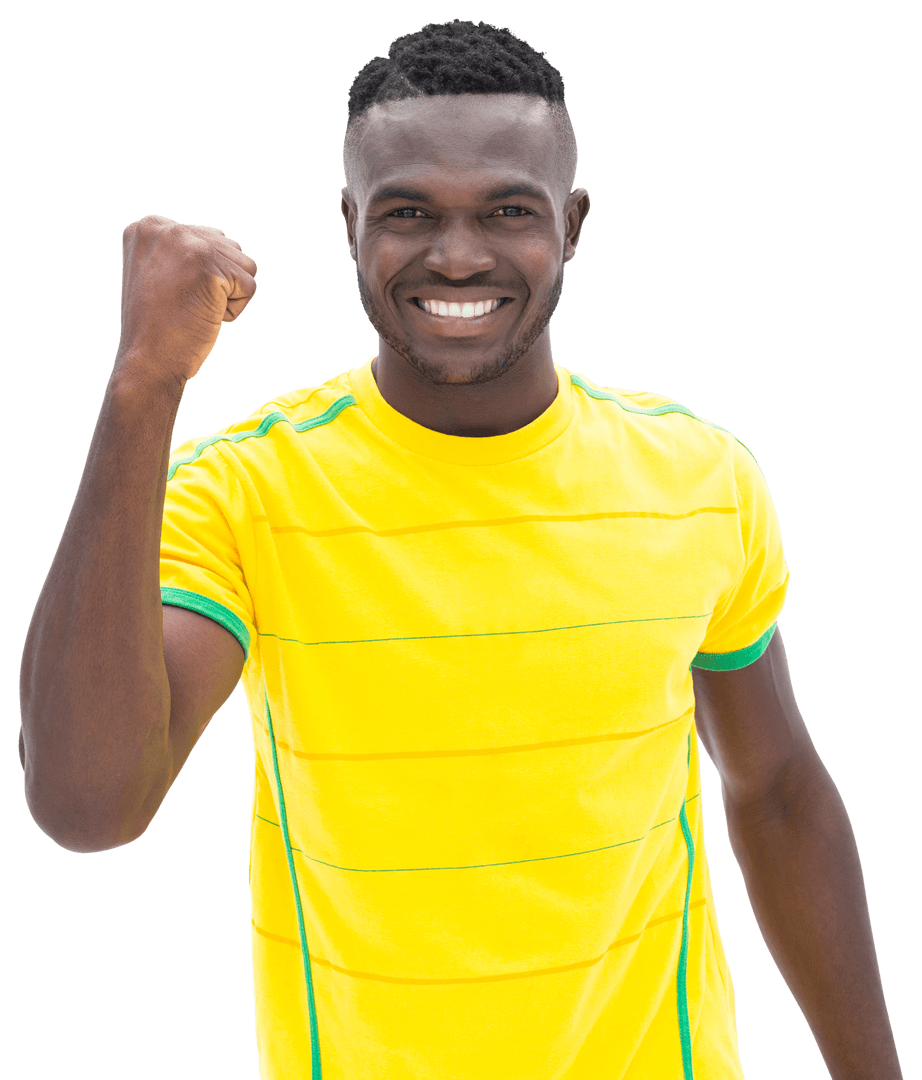 Smiling Athlete in Yellow Jersey Clenching Fist on Transparent Background