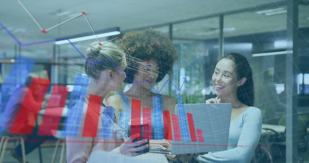 Diverse Businesswomen Utilizing Digital Interface for Data Analysis