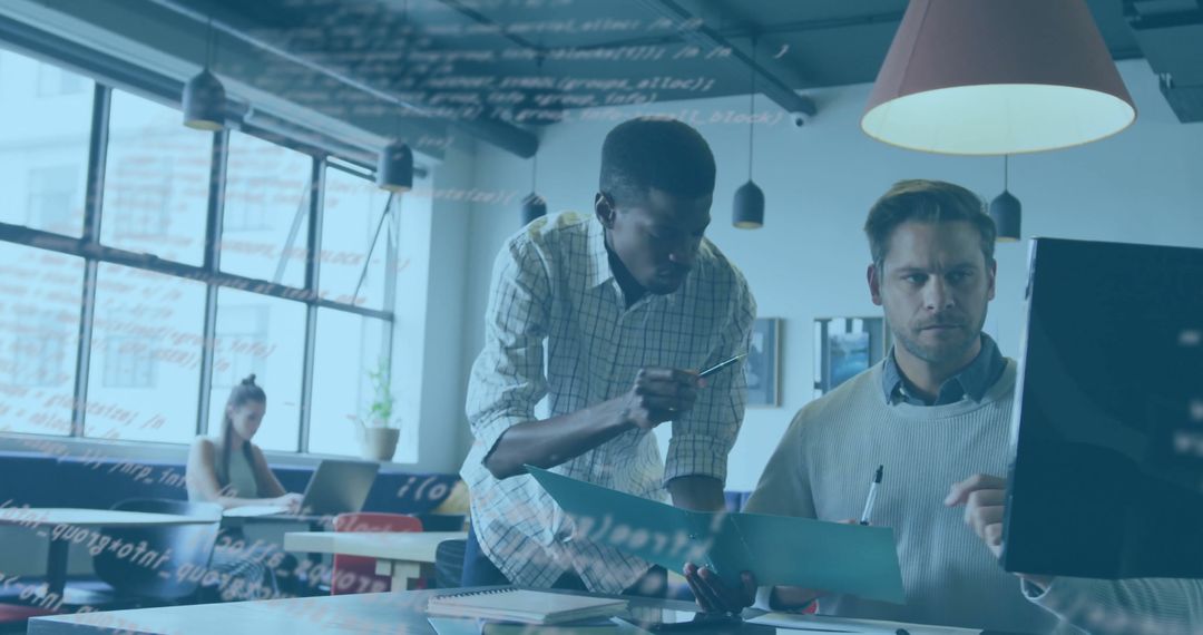 Developers Collaborating in Modern Industrial Workspace