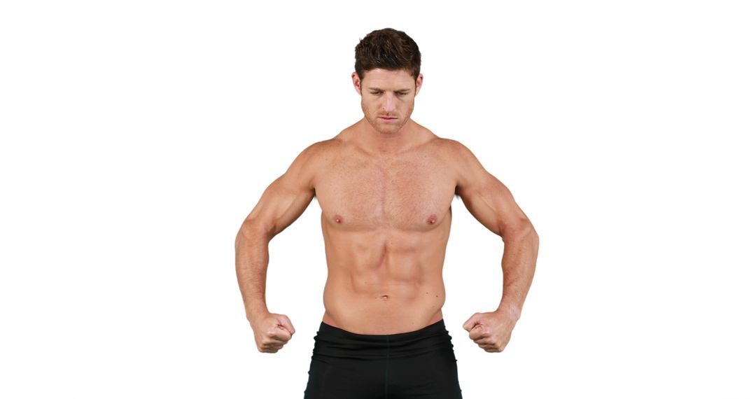 A muscular Caucasian man is posing to showcase his fit physique, with copy space - Free Images, Stock Photos and Pictures on Pikwizard.com