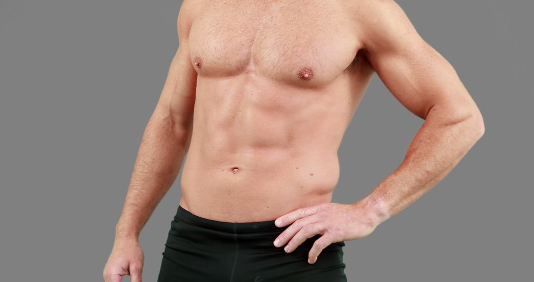 A Caucasian adult male showcases his fit physique, with copy space - Free Images, Stock Photos and Pictures on Pikwizard.com