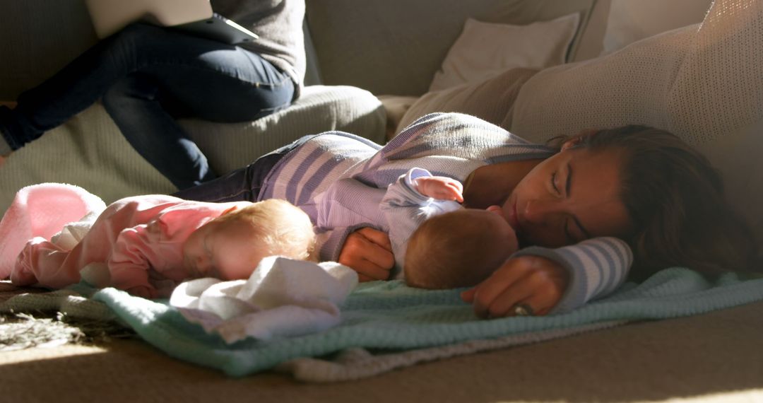 Mother Resting on Floor with Twin Babies - Free Images, Stock Photos and Pictures on Pikwizard.com