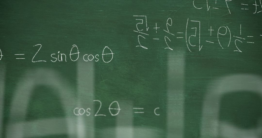Mathematical Equations on Chalkboard with Handwritten Formulae
