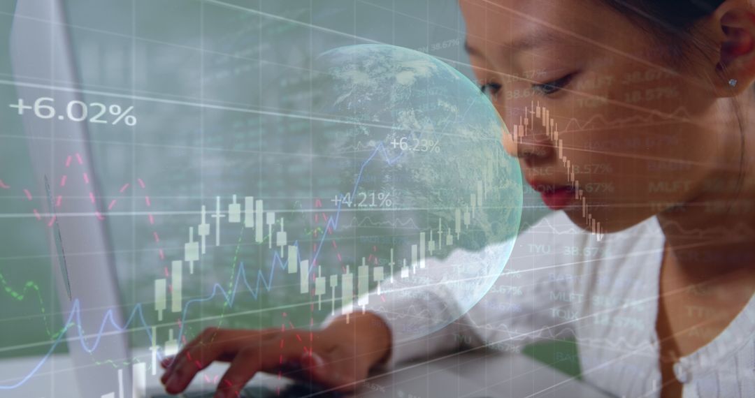 Asian Businesswoman Analyzing Financial Data with Futuristic Interface - Free Images, Stock Photos and Pictures on Pikwizard.com