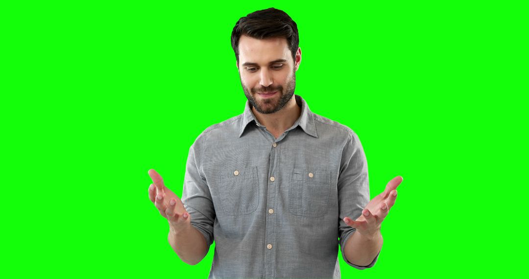 Smiling Bearded Man Gesturing with Hands Isolated on Green Screen - Free Images, Stock Photos and Pictures on Pikwizard.com