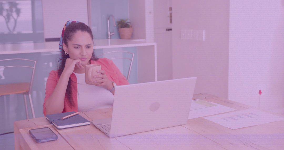 Woman Working from Home with Coffee on Work Desk