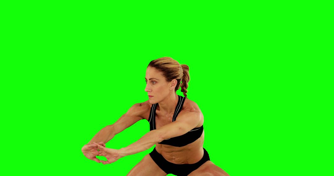 Fit Woman Exercising Squats with Green Screen Background - Free Images, Stock Photos and Pictures on Pikwizard.com