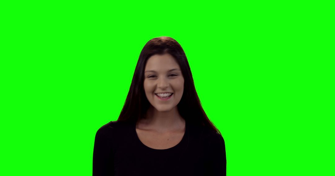 Happy Young Woman with Green Screen Background - Free Images, Stock Photos and Pictures on Pikwizard.com