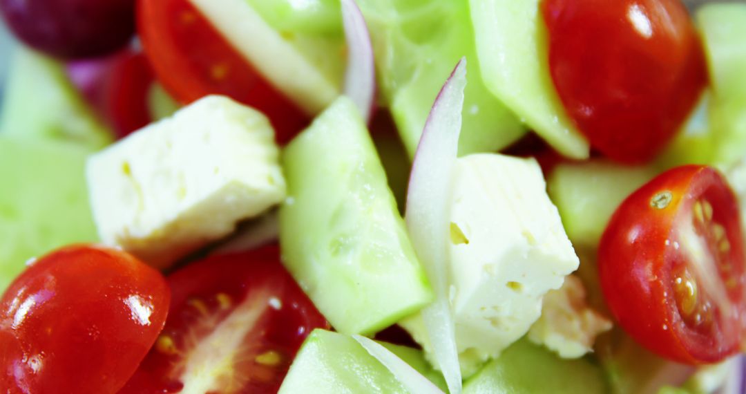 Fresh Greek Salad with Cherry Tomatoes, Cucumbers, Red Onions, and Feta Cheese - Free Images, Stock Photos and Pictures on Pikwizard.com