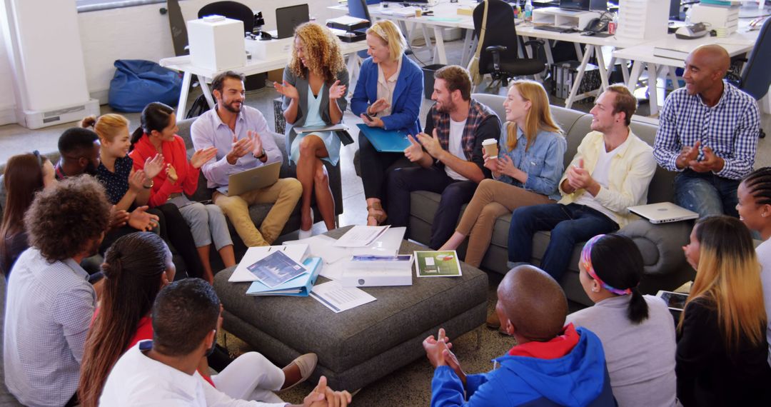 Diverse Team Collaboratively Engaging in Modern Office Meeting