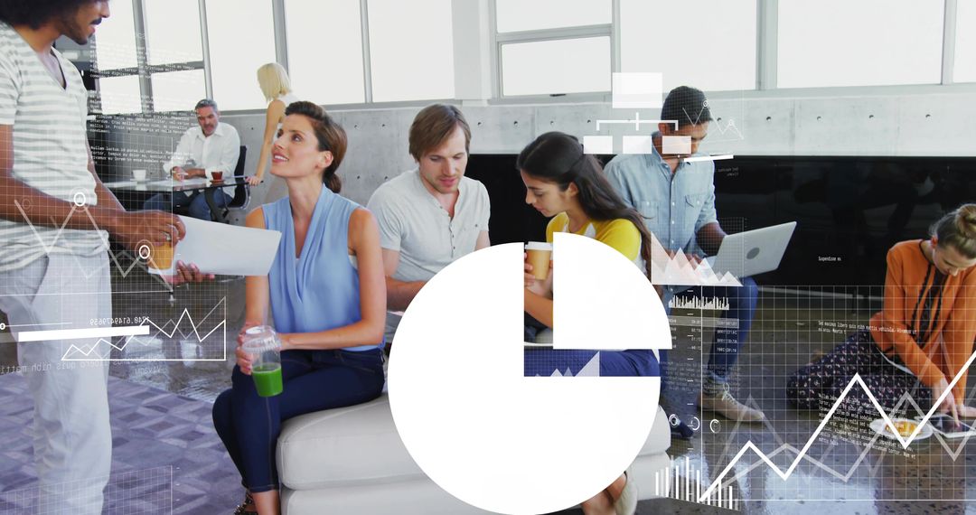 Creative team collaborating in modern open lounge with laptops, charts and casual meeting