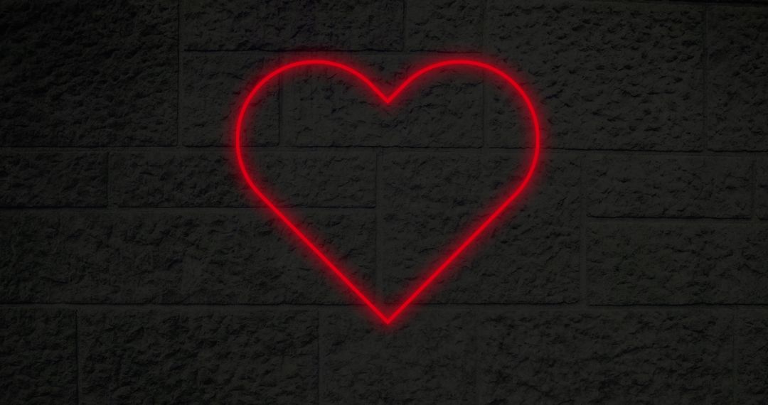 Glowing Neon Heart on Brick Wall Background