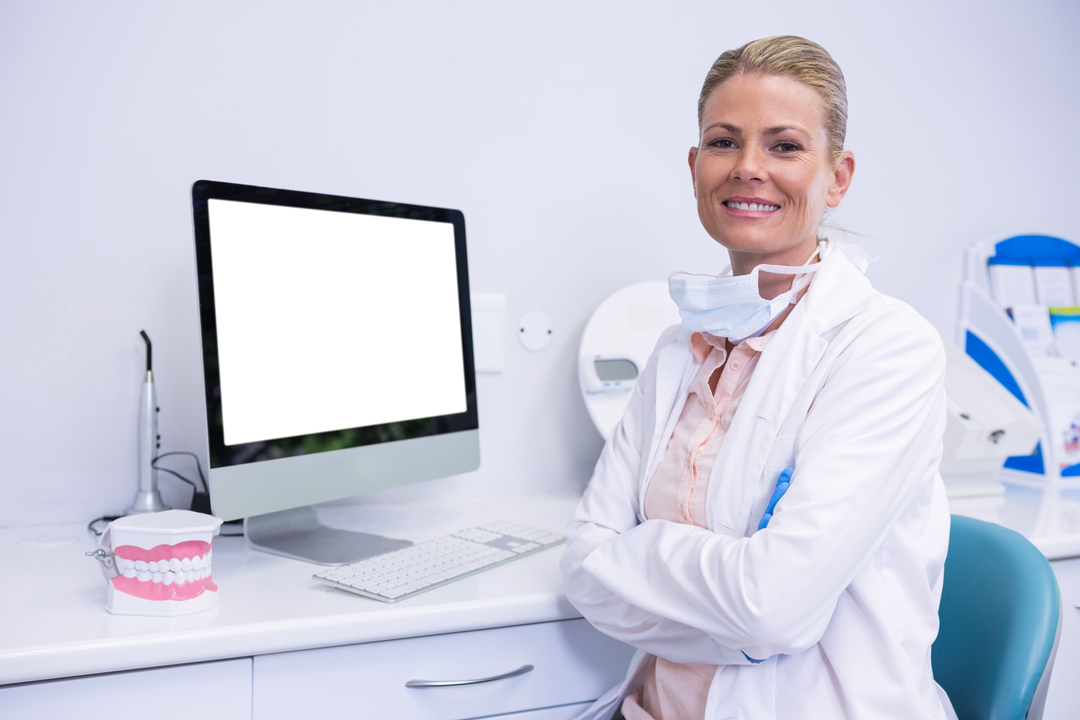 Smiling Dentist in Medical Clinic with Transparent Computer - Download Free Stock Images Pikwizard.com