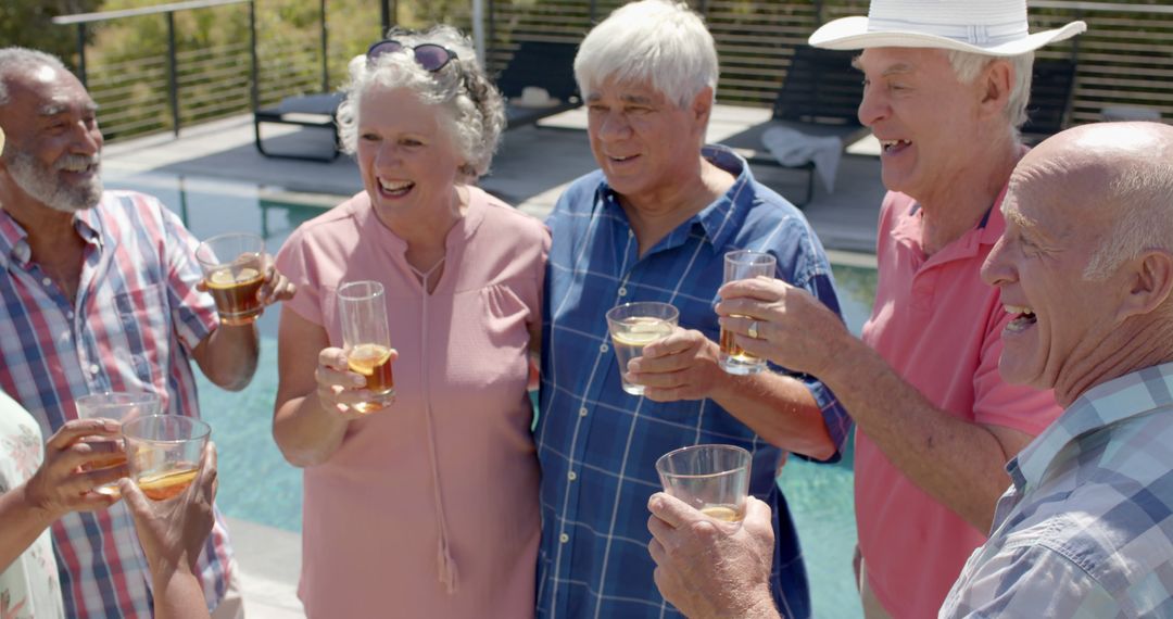 Group of Senior Friends Enjoying Drinks by Poolside - Free Images, Stock Photos and Pictures on Pikwizard.com