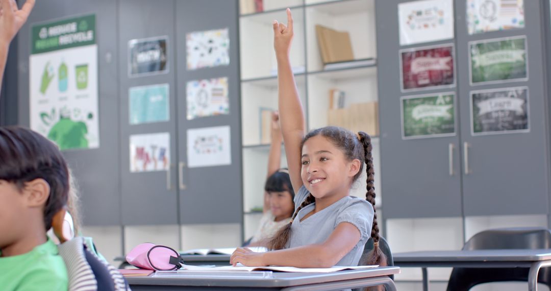 Engaged Student Raising Hand in Active Learning Environment