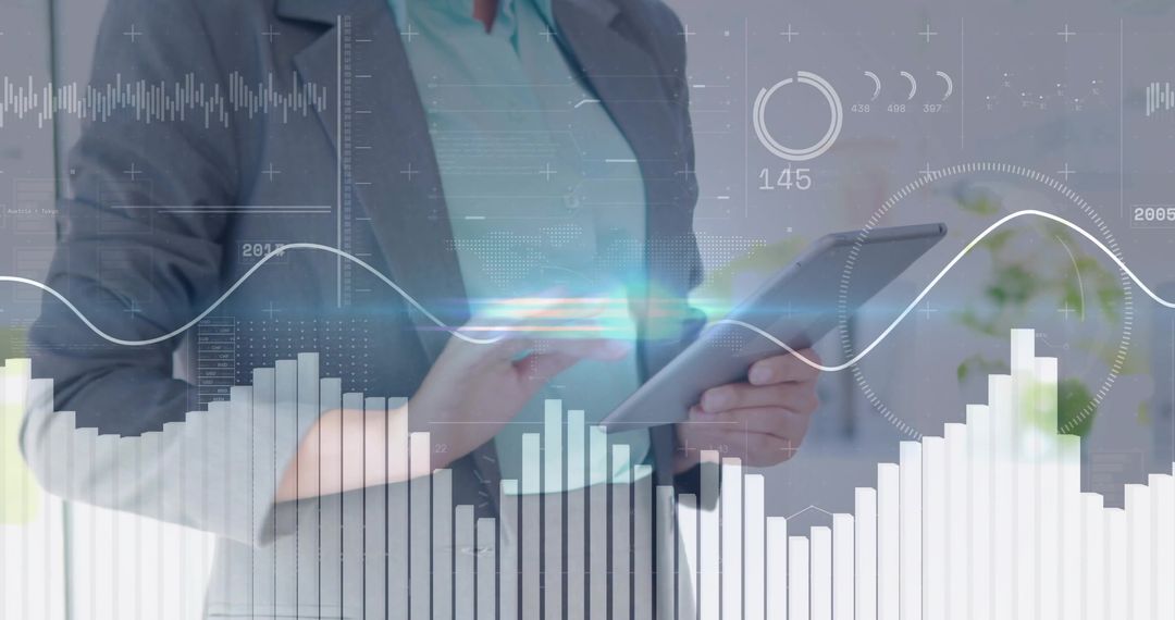 Businesswoman Using Tablet with Financial Data Overlays, Charts and Digital Analytics Dashboard