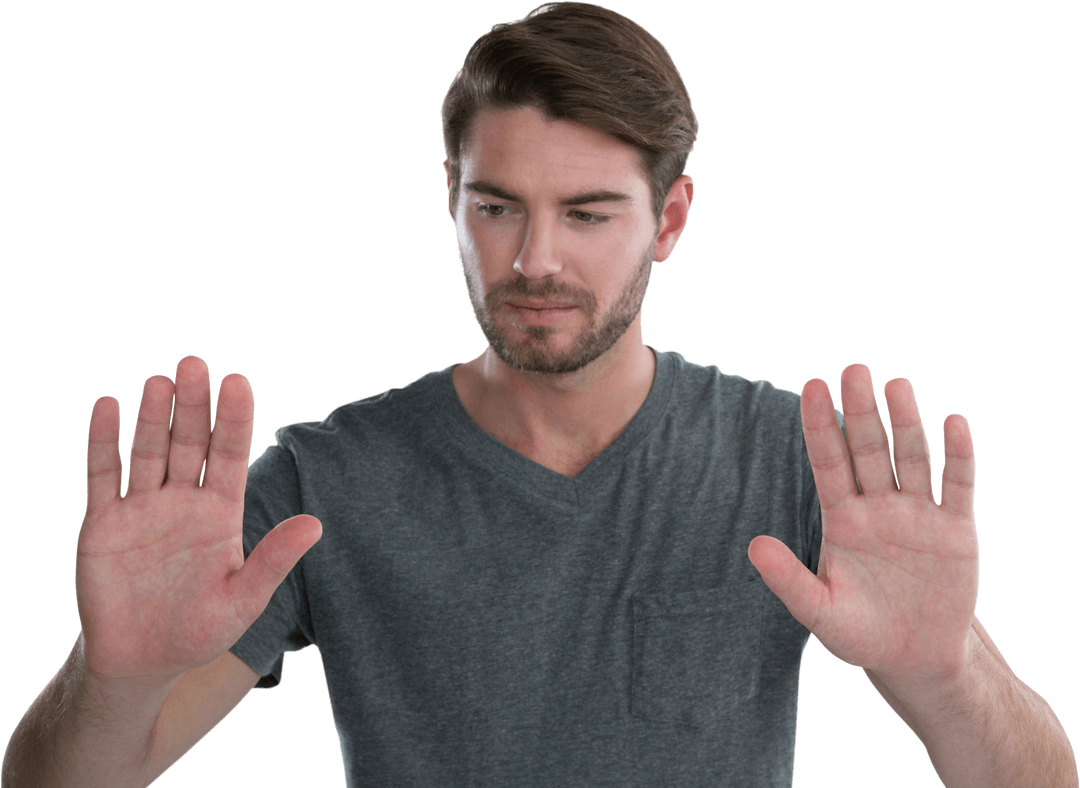 Young Man Interacting with Transparent Virtual Screen Concept