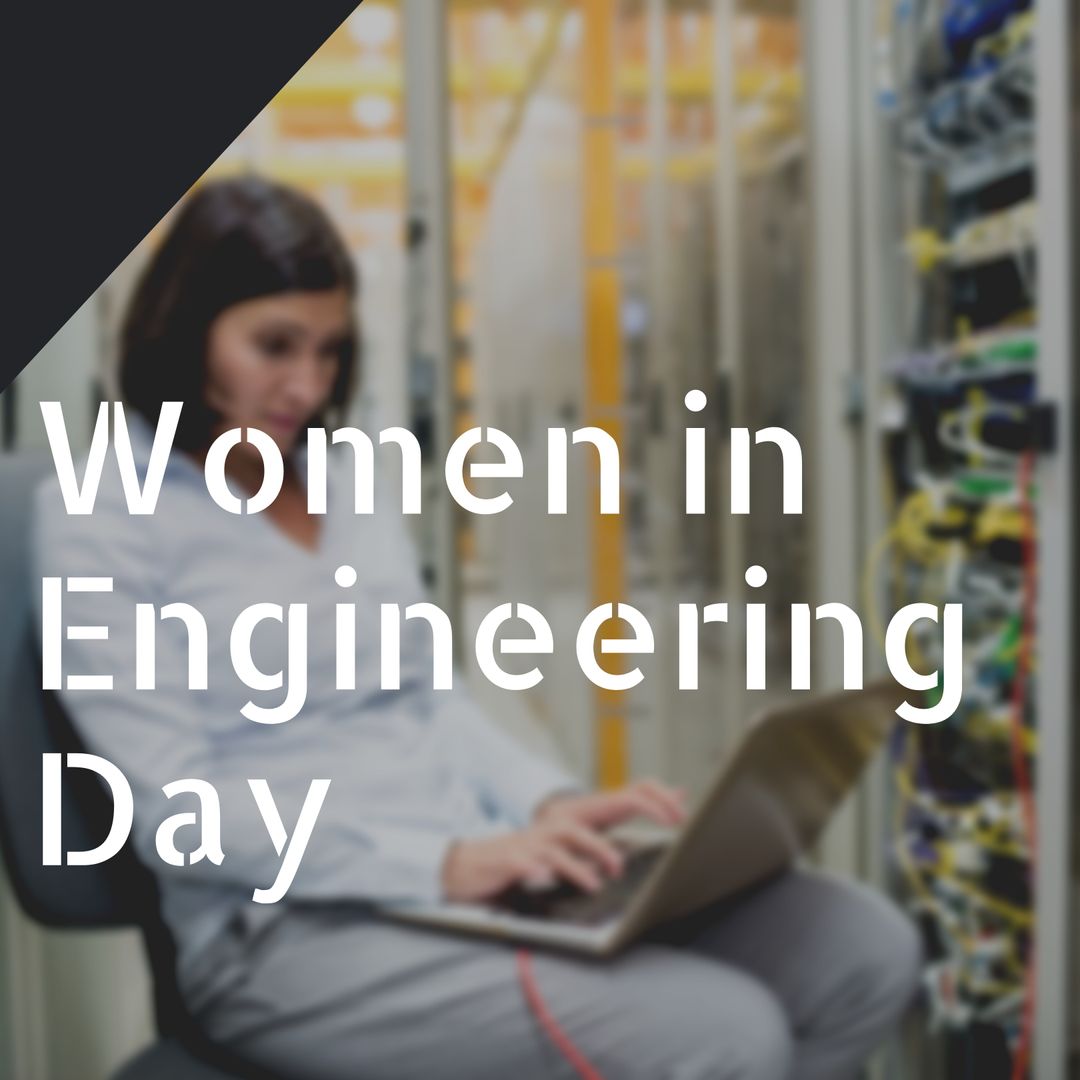 Woman Engineer Using Laptop in Data Center for Engineering Day
