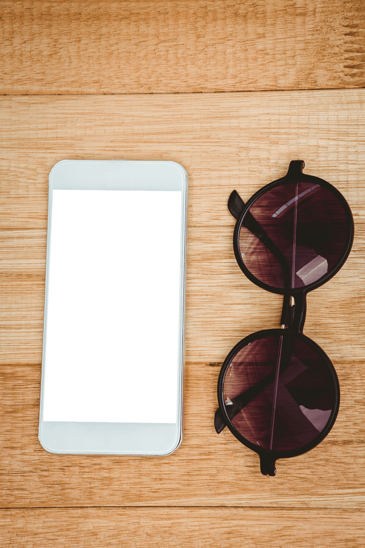 Transparent Smartphone and Glasses on Wooden Surface