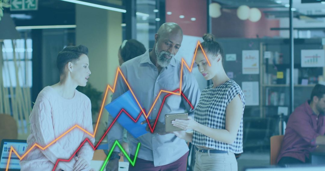 Colleagues Collaborating with Digital Financial Graphs