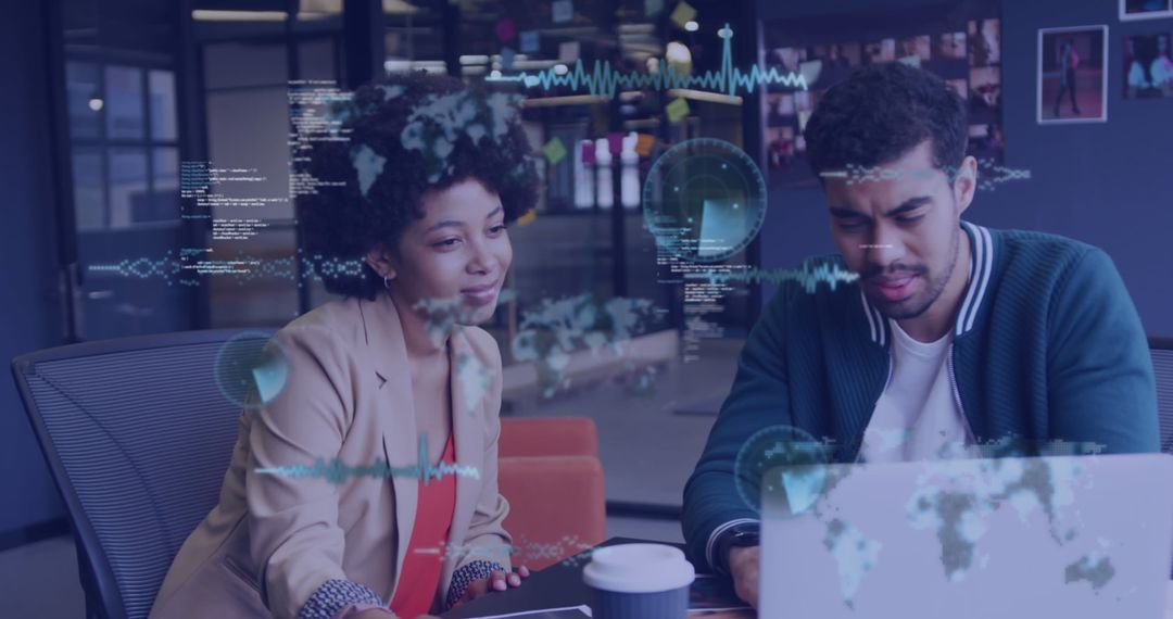 Diverse Team Analyzing Data on Laptop with Digital Graphics