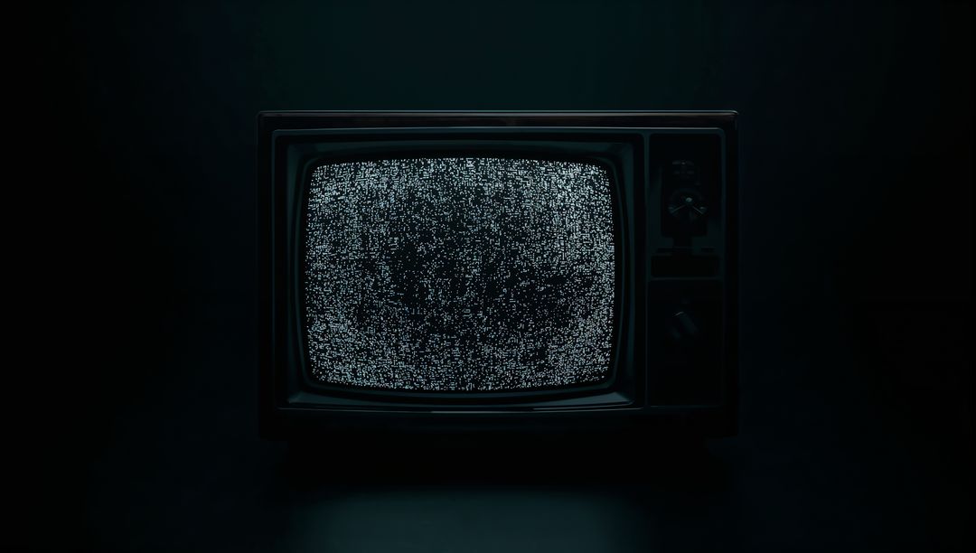 Vintage CRT TV Displaying Static in Dark Ambience