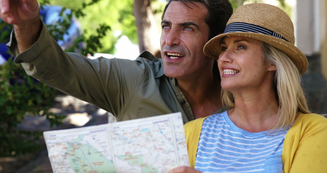 Smiling Couple Exploring City with Map on Sunny Day