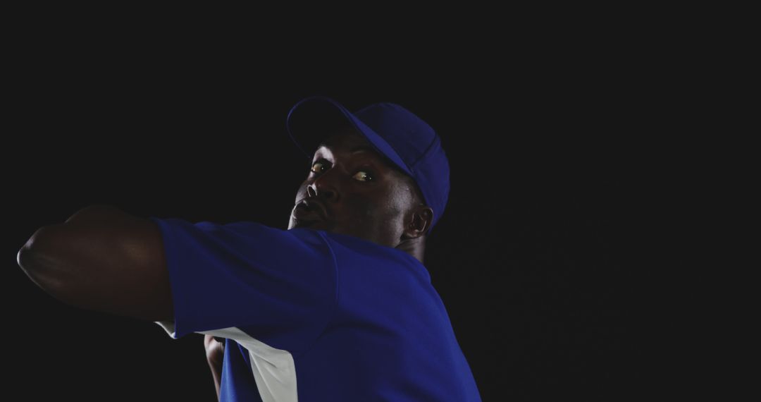 African American Baseball Player on Black Background - Free Images, Stock Photos and Pictures on Pikwizard.com