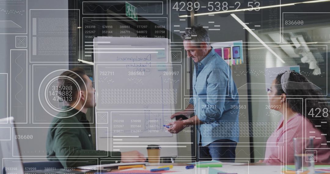 Colleagues in Meeting with Data Visualization Graphics