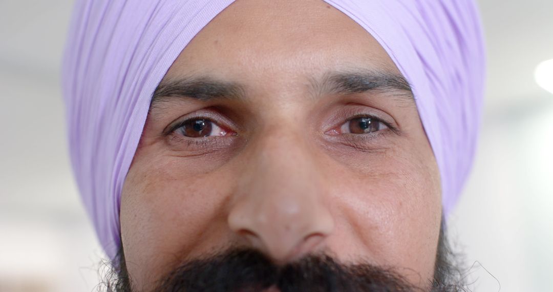 Close-Up of Confident Sikh Doctor Smiling at Camera