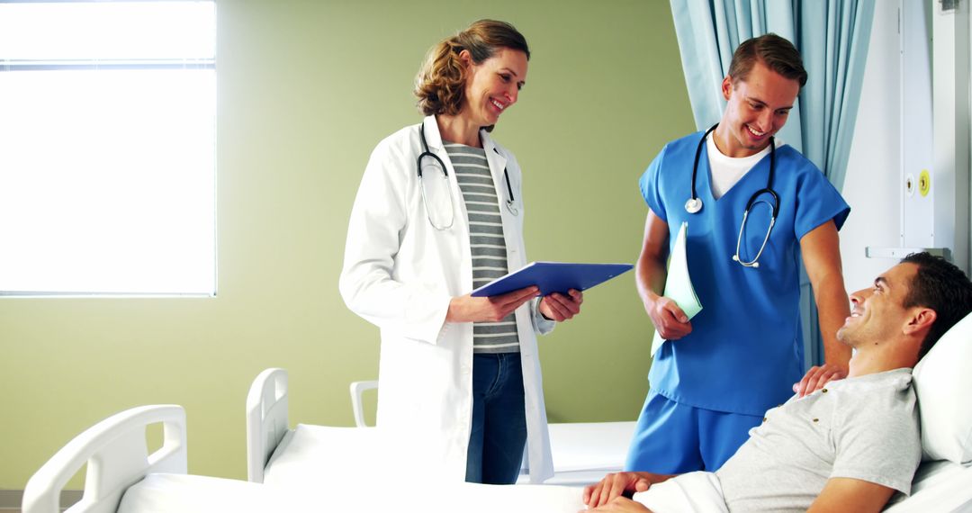 Doctor and Nurse Consulting with Patient in Hospital - Free Images, Stock Photos and Pictures on Pikwizard.com