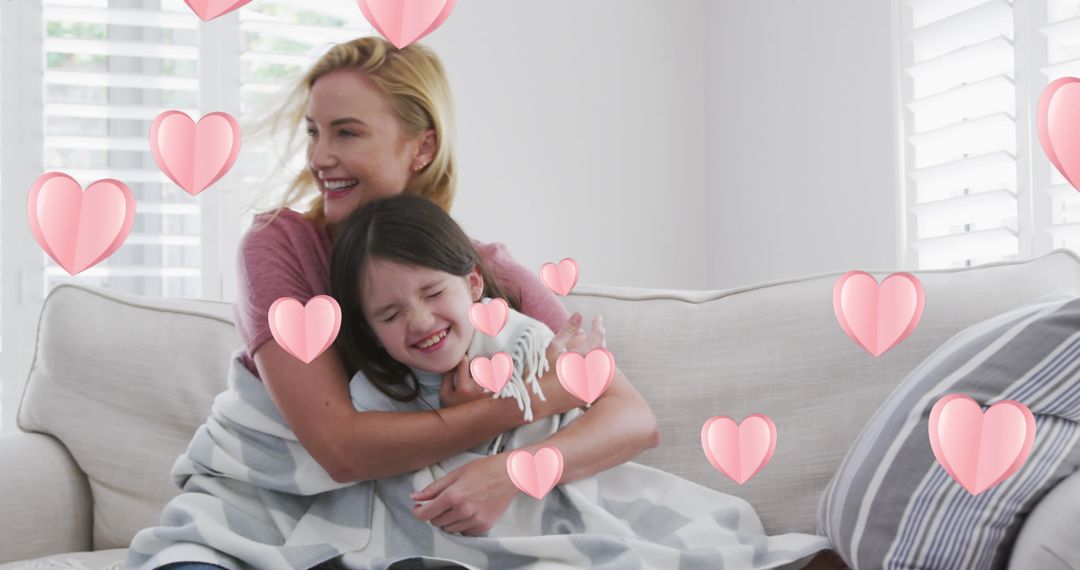 Mother Hugging Daughter with Floating Hearts