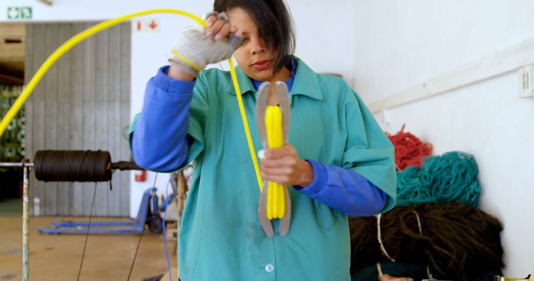 Female Factory Worker Using Industrial Tools in Workshop - Free Images, Stock Photos and Pictures on Pikwizard.com